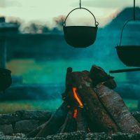 Cooking the old-fashioned way Image of cooking over an open fire